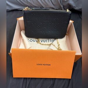 Authentic Louis Vuitton Pochette Double Zip in Monogram Empreinte leather